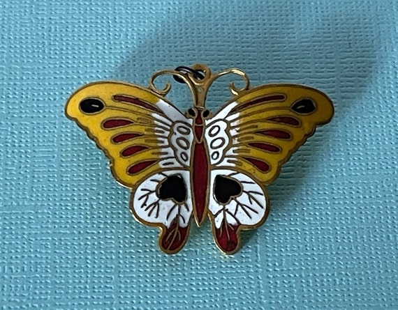 Yellow butterfly pin top