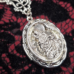 wolf calling to moon locket necklace  unisex pagan jewellery