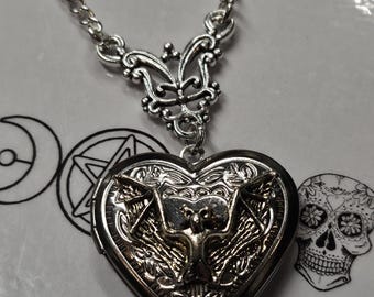 Stainless steel heart shaped locket with vampire bat