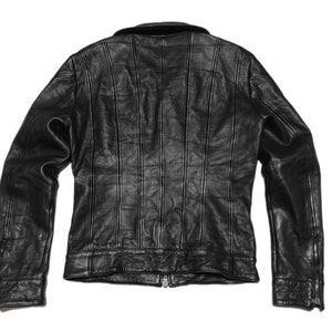 May include: A black leather jacket with a zipper closure and a classic design.