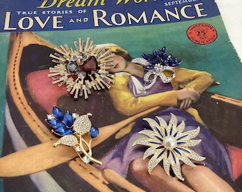 Een mooie selectie van 4 sprankelende broches in vintage-stijl