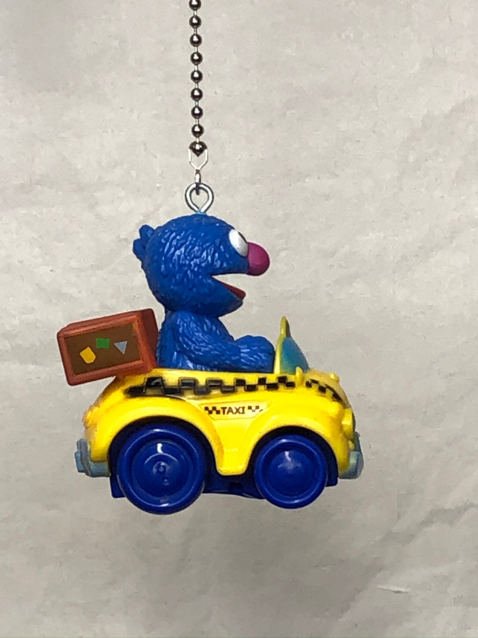 Ernie in his Rubber Ducky Car & Grover in his Taxi Car Ernie in his Rubber Ducky Car & Grover in his Taxi Car
