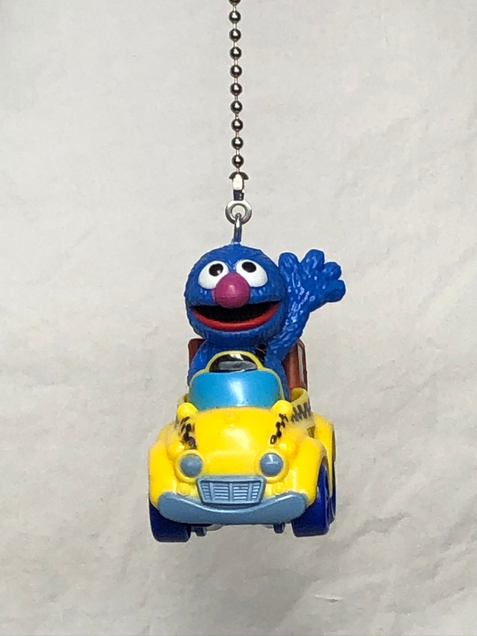 Ernie in his Rubber Ducky Car & Grover in his Taxi Car Ernie in his Rubber Ducky Car & Grover in his Taxi Car