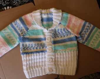 Hand Knitted Child/Toddler Cardigan to fit chest approx. 20inches Chest -Age approx.  2 - 3 yrs - Mainly White with blue, green and pink