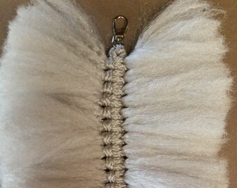 Gray Feather with silver clasp