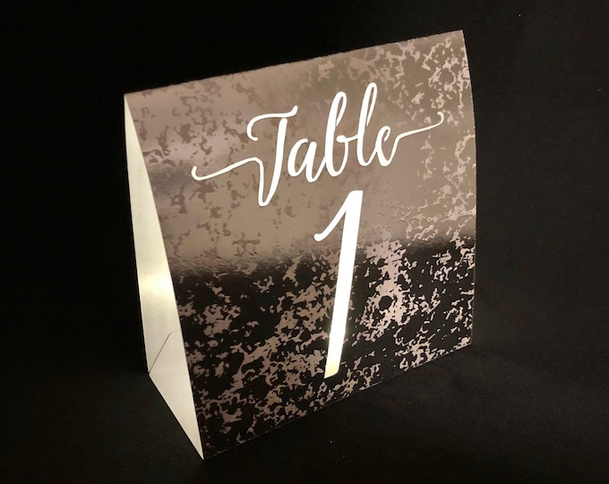 Gorgeous Table Number Luminaries are made from Mercury Glass Cardstock in Silver or Rose Gold; OR Matte Black, White, Cream, Pink, or Navy.