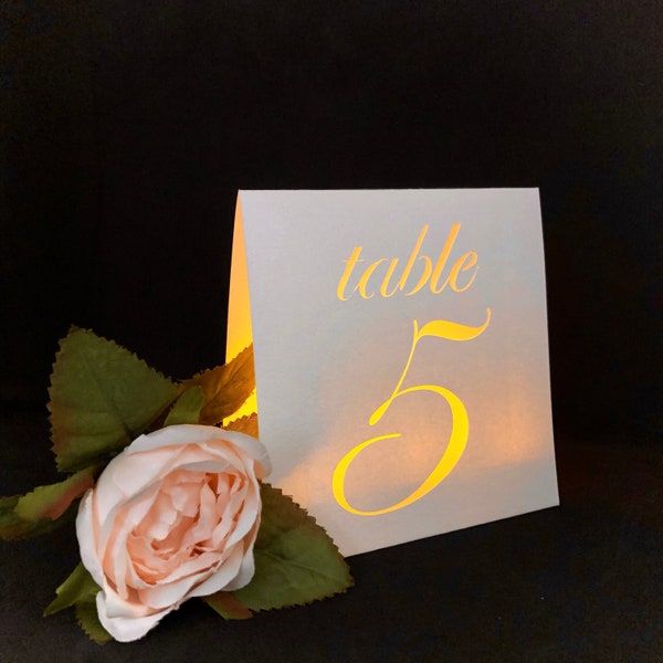 CLASSIC table number luminaries are made with White Pearl, Gold Leaf,  or Silver Gray Card Stock. Table Numbers for Weddings & Banquets