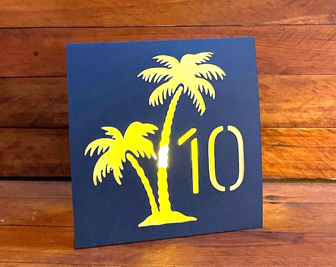 Palm Tree Table Number Luminaries for wedding. So easy to transport and set up on site.