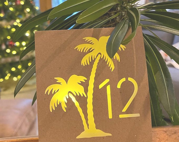 Palm Tree Table Number Luminaries for wedding. So easy to transport and set up on site.