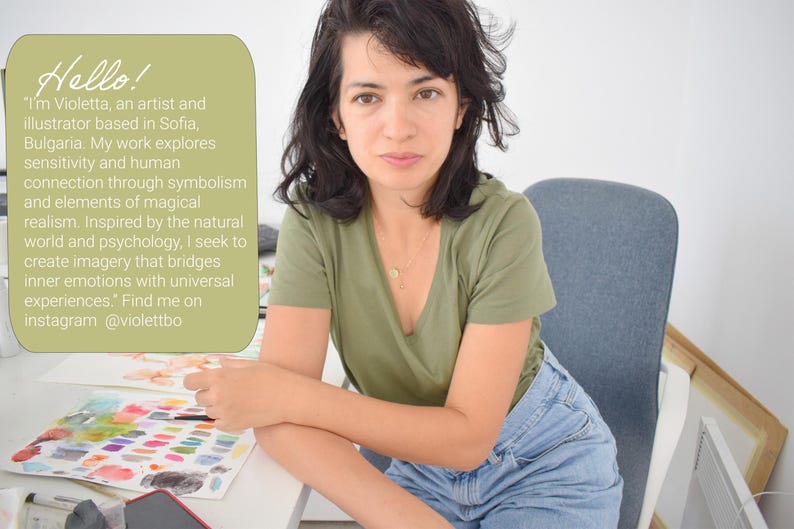 May include: A woman in a green v-neck shirt and blue jeans sits at a desk. A light green rounded rectangle in the upper left corner contains the text "Hello!" and a description of the artist Violetta and her work. Watercolor paints and a phone are on the desk.