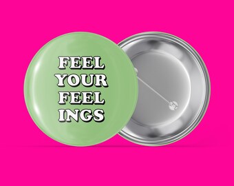 Puede incluir: Un botón verde con el texto "FEEL YOUR FEEL INGS" en letras blancas.