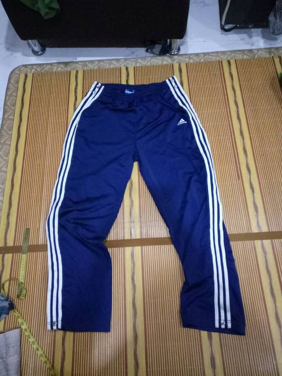 the brand with the three stripes tracksuit