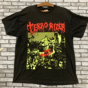 May include: Black t-shirt with a graphic print of a band called "TERRORIZER" with the words "WORLD DOWNFALL" in red.