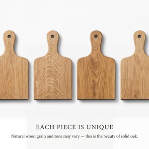 Four wooden cutting boards of different shapes and sizes, each with a unique design, are displayed against a white background.