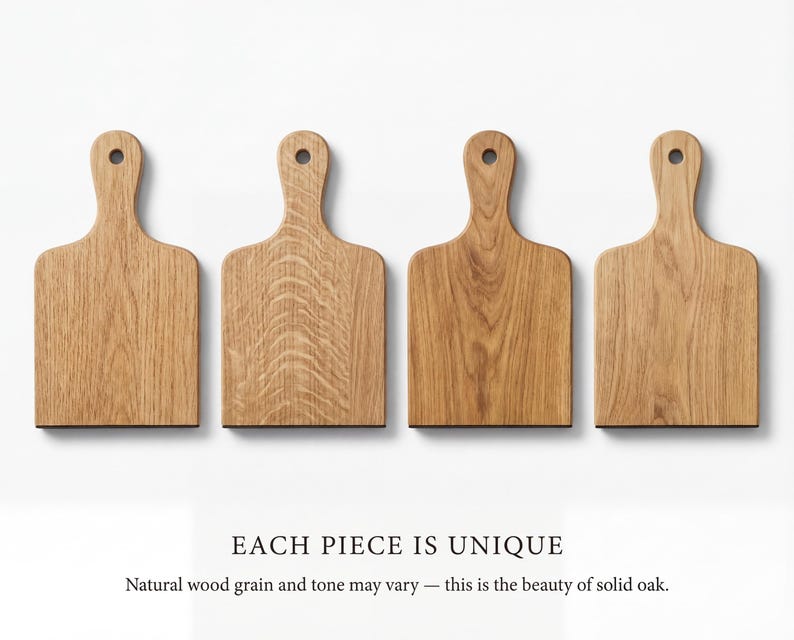 Four wooden cutting boards of different shapes and sizes, each with a unique design, are displayed against a white background.