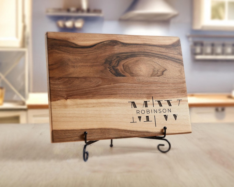 a wooden cutting board sitting on top of a table