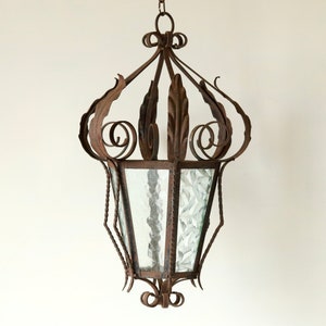 French Vintage Large Wrought Iron Lantern with 6 Glass Panels, Baroque and Spanish Revival Hanging Light, 1900s Rustic Metal Porch Lighting