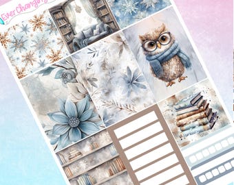 May include: A set of planner stickers featuring a wintery theme with images of snowflakes, owls, books, and floral patterns. The stickers are designed in a watercolor style with a light blue and brown color scheme. The text "Ever Changing Plans" is included in the image.
