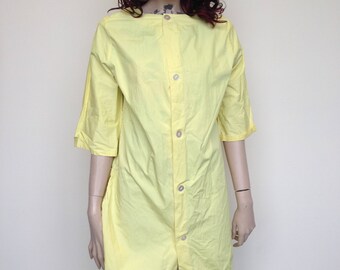 Yellow Coverall With Back Pocket for supplies!