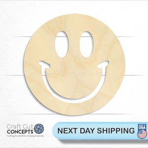 May include: A wooden smiley face cutout, perfect for crafting projects. The smiley face is cut out of a round piece of wood and has a simple design.