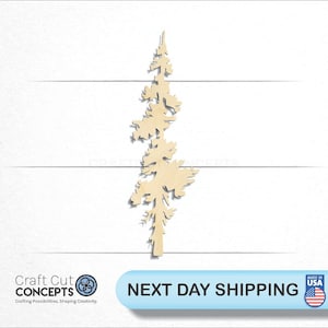 May include: A wooden cutout of a tall, slender pine tree with a detailed silhouette. The tree is light brown and has a rustic, natural look.