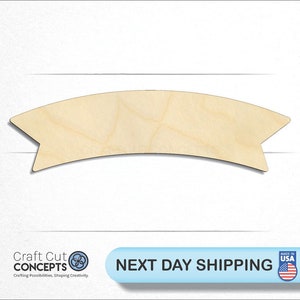 May include: A natural wood banner with a curved top and pointed ends. The banner is blank and ready to be painted or decorated.