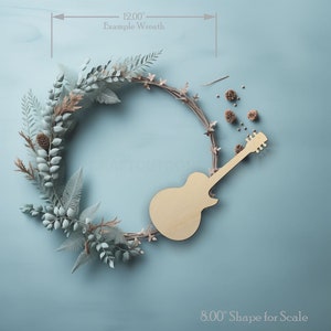 Guitar Shape wood craft shape on a wreath showing scale.