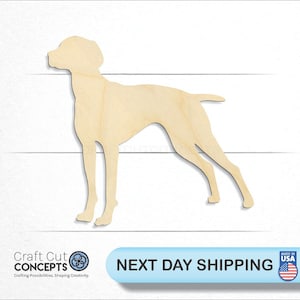 May include: A wooden cutout of a dog in a standing position. The dog is facing to the left and has a long snout and tail. The cutout is made of unfinished wood and is ready to be painted or stained.