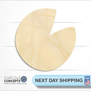 May include: A light brown wooden cutout of a circle with a section removed, resembling a Pac-Man shape. The cutout is made of unfinished wood and is ready for painting or staining.