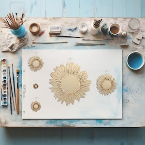 Sun Flower Engraved Details Craft blanks next to paint brush showing scale