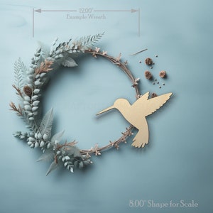 Hummingbird Craft Shape wood craft shape on a wreath showing scale.