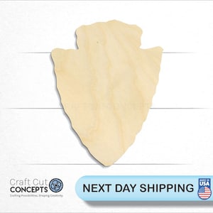 May include: A wooden arrowhead shape, cut from natural wood, with a light brown color. The arrowhead is a craft supply for creating DIY projects.
