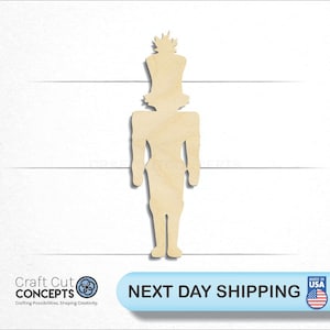 May include: Wooden cutout of a nutcracker soldier. The nutcracker is standing tall with a hat and a mustache. The cutout is unpainted and ready to be decorated.