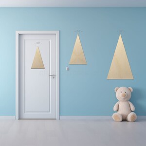 Triangle Shape Equilateral sign shapes on a door and wall to view the scale.