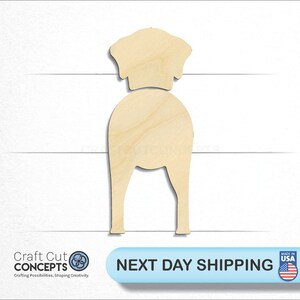 May include: A wooden cutout of a dog in a standing position. The dog is light brown and has a simple design.
