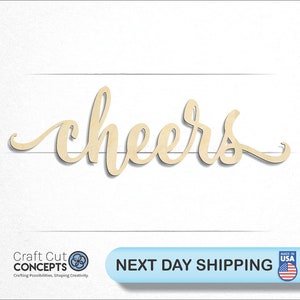 May include: Wooden sign with the word "cheers" in a cursive font. The sign is made of natural wood and has a light brown color.