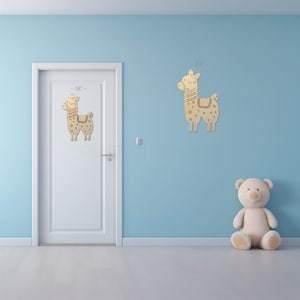 Alpaca Lama Shape Paint by Line sign shapes on a door and wall to view the scale.