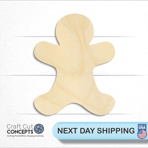 May include: Unfinished wooden gingerbread person cutout. The cutout is shaped like a gingerbread person with arms outstretched and legs spread apart. The cutout is made of natural wood and is ready to be painted or decorated.