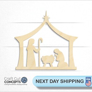 May include: Wooden cutout of a nativity scene with a star on top of the stable. The figures of Mary, Joseph, and the baby Jesus are included.