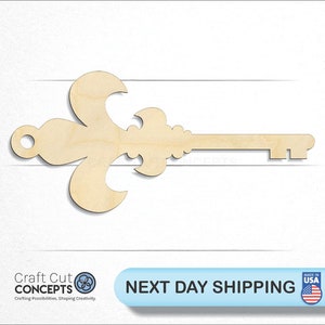 May include: A wooden key with a decorative fleur-de-lis design. The key is unfinished and ready to be painted or stained.