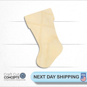 May include: A wooden Christmas stocking cutout, perfect for crafting and decorating. The stocking is made of unfinished wood and is ready to be painted or stained.