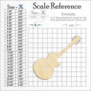 Guitar Shape unfinished wood craft blank showing the measurement scale.