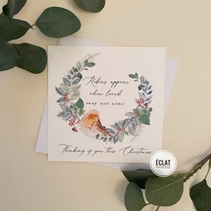 Avec carte de condoléances sur votre perte, condoléances à la carte de Noël, rouge-gorge, rouge-gorge apparaissent lorsque les êtres chers sont proches