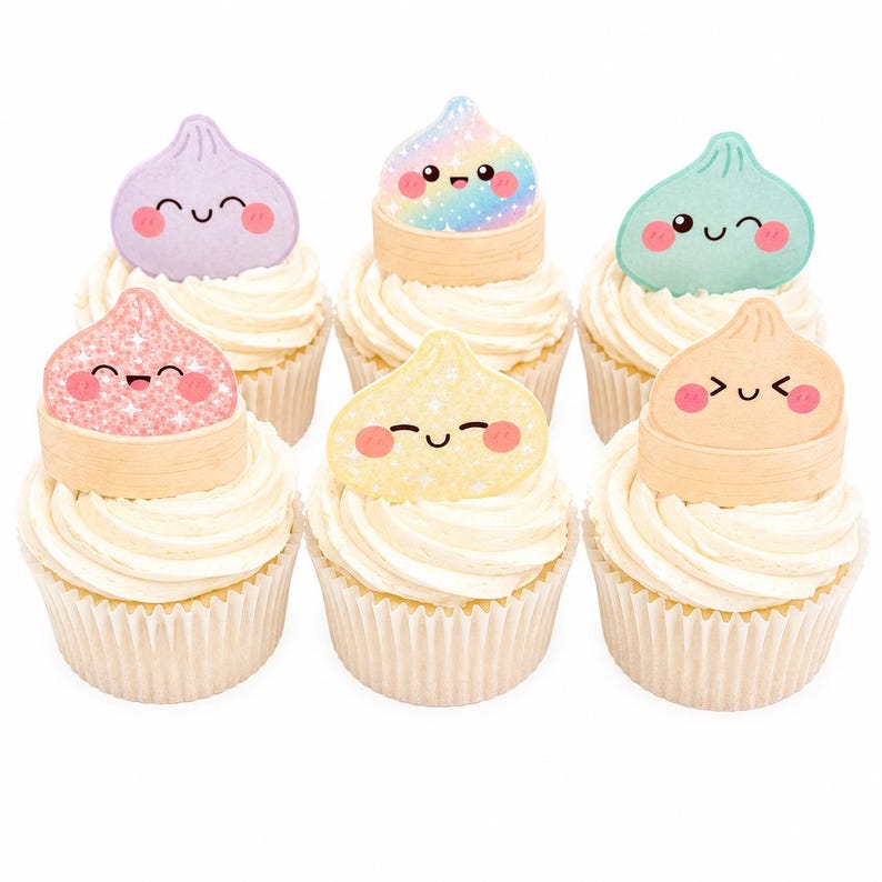 May include: Six cupcakes topped with white frosting and decorative toppers shaped like smiling dumplings. The toppers feature various colors including lavender, rainbow, teal, pink glitter, yellow, and tan, each with a cute cartoon face.