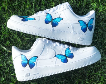 nikes with butterflies on them
