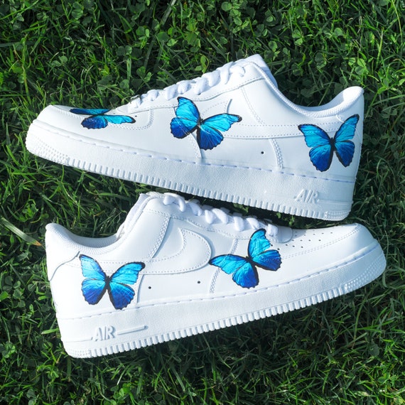 white air force ones with blue butterflies