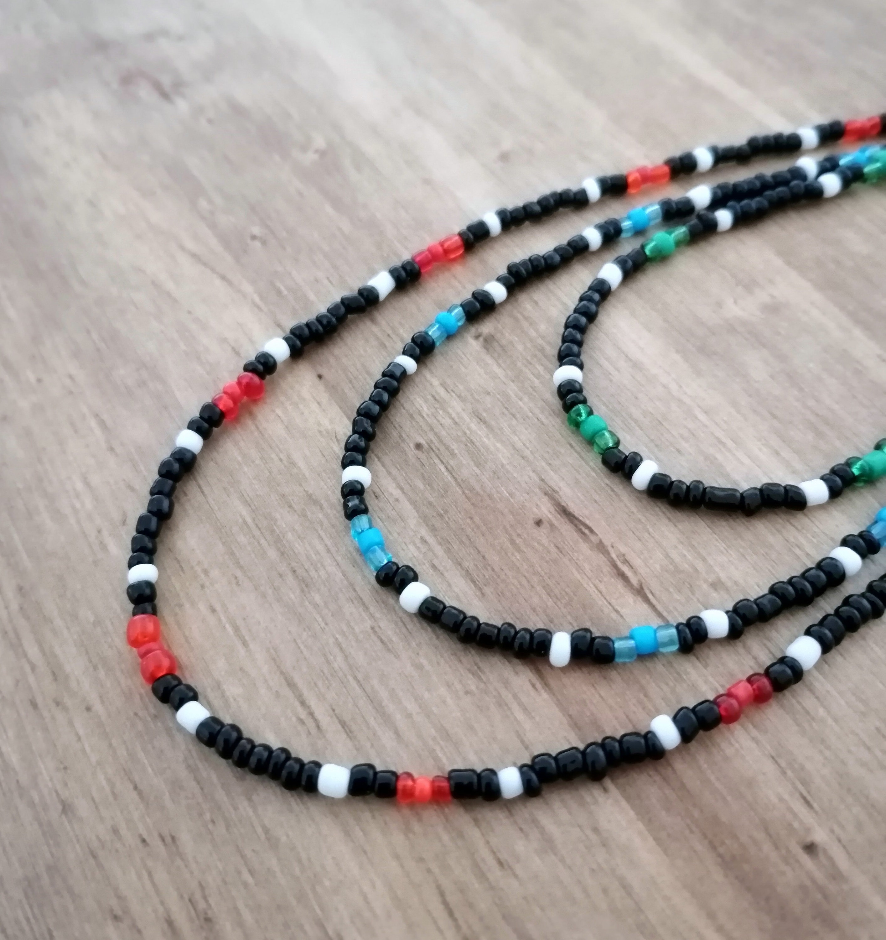 Red and black beads on sale necklace