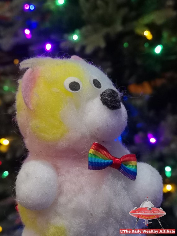 teddy bear with purple bow tie