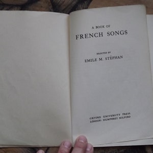 May include: A book titled "A Book of French Songs" selected by Emile M. St&eacute;phan, published by Oxford University Press, London: Humphrey Milford.