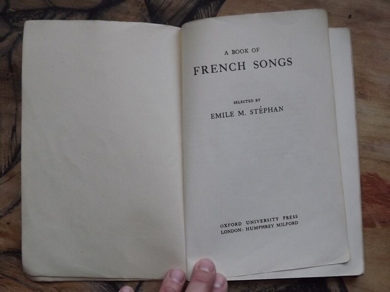May include: A book titled "A Book of French Songs" selected by Emile M. St&eacute;phan, published by Oxford University Press, London: Humphrey Milford.